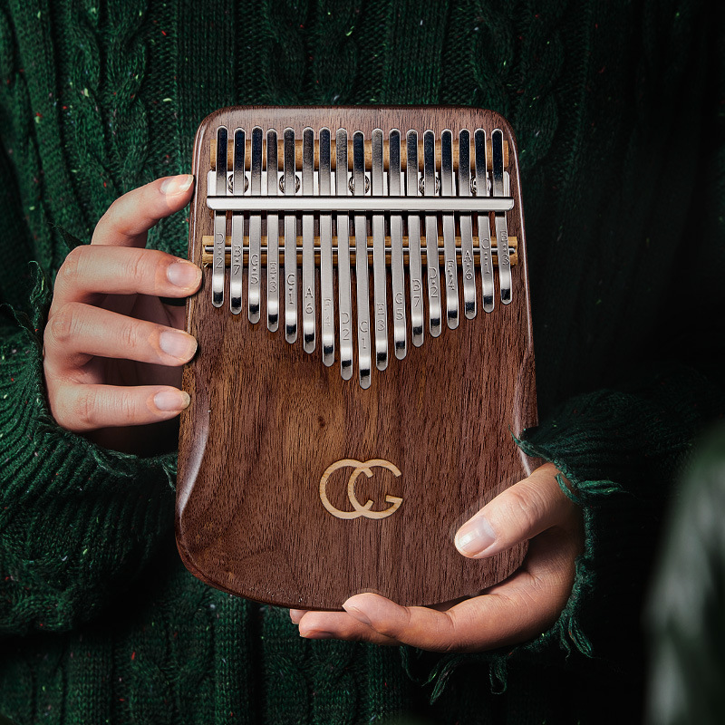 17 21 مفتاح الإبهام البيانو Ka - مراجعة A Musical Instrument With Keys وسعره