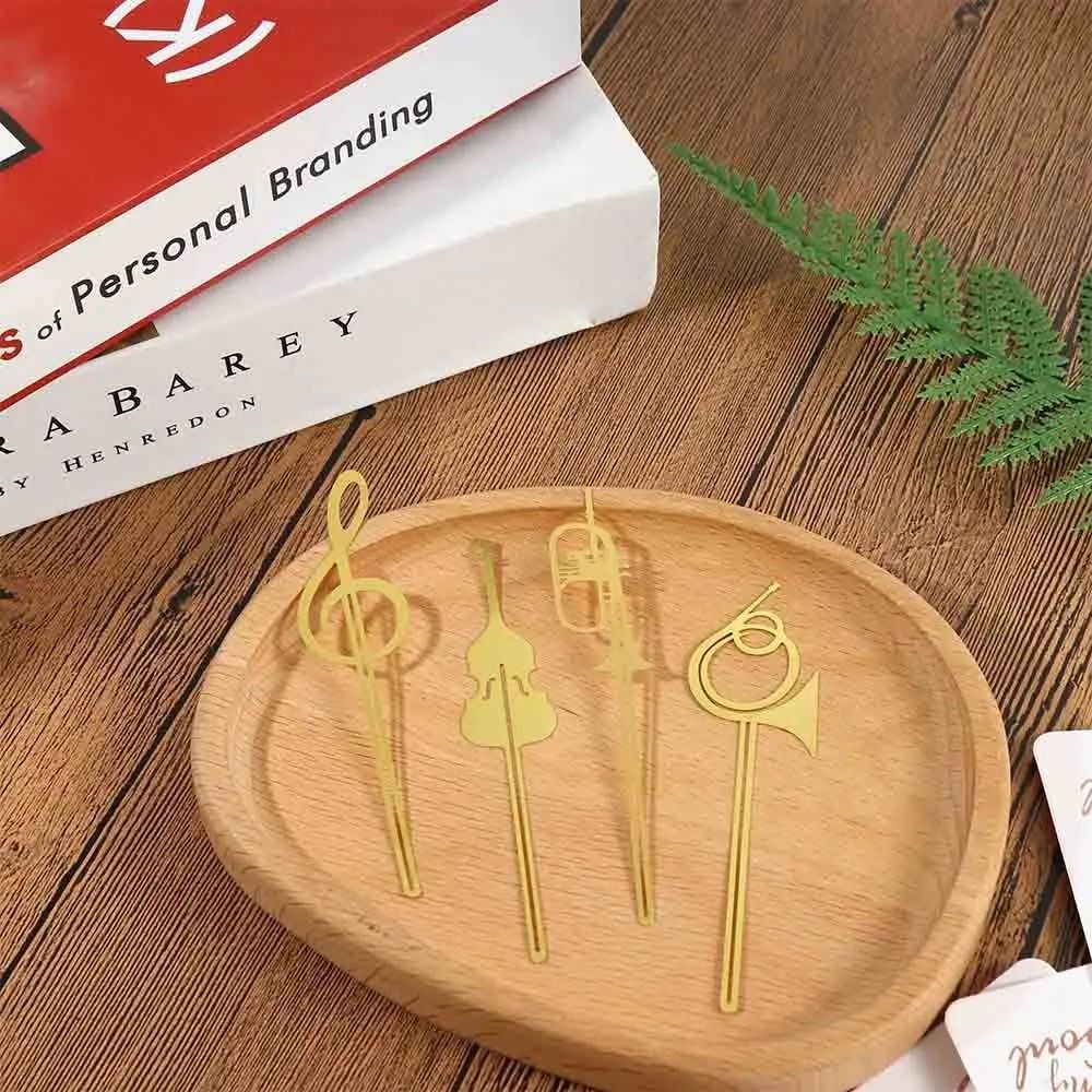 فاصل كتب معدني متين بتصميم نوت - مراجعة Musical Instrument Book وسعره