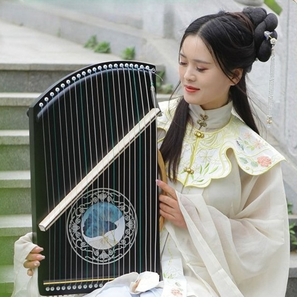 جهاز تدريب تقنية الإصبع الاحتر - مراجعة Musical Instrument Guzheng وسعره