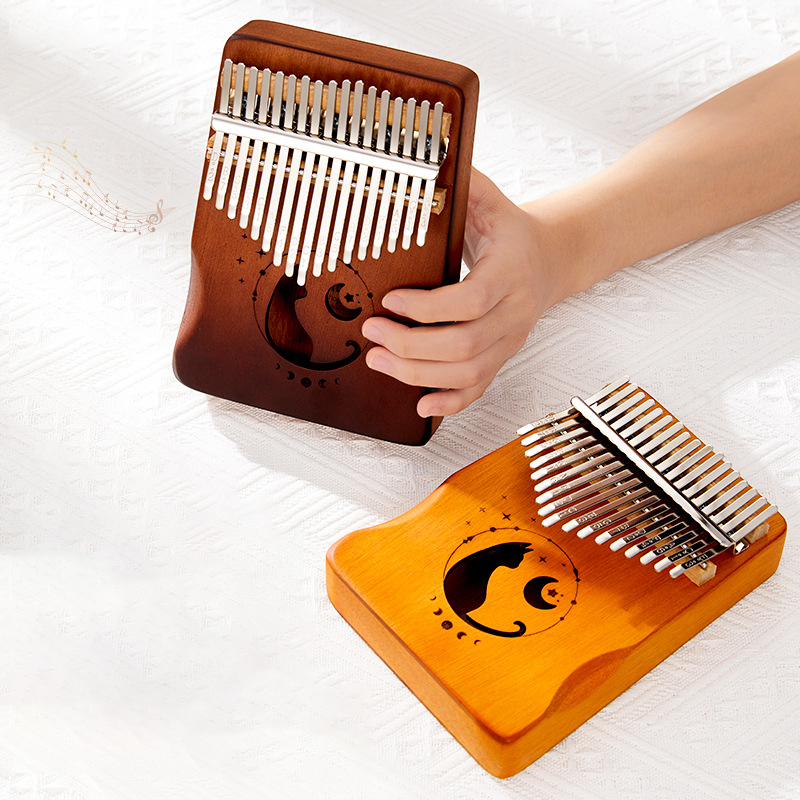 17 مفتاح كاليمبا متدرج اللون ت - مراجعة A Musical Instrument With Keys وسعره