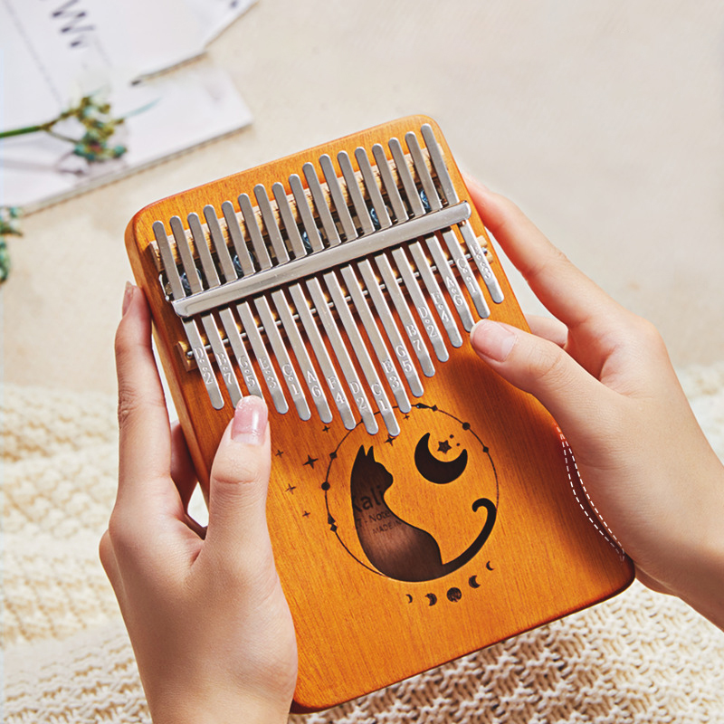 17 مفتاح كاليمبا متدرج اللون ت - مراجعة A Musical Instrument With Keys وسعره